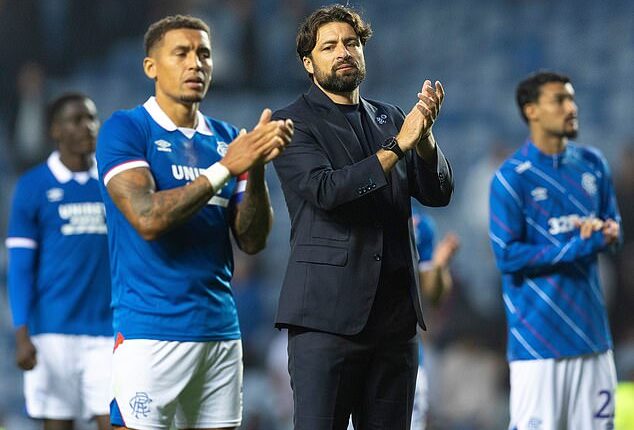 Russell Martin and James Tavernier applaud the Ibrox crowd after the Panathinaikos win
