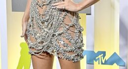 Taylor Swift fans have fiercely slammed Scooter Braun after he seemed to claim that his drama with the singer lead to the 'biggest moment of her career'