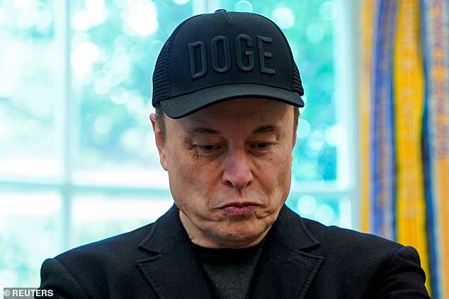 Elon Musk stands in the Oval Office to attend a press conference with U.S. President Donald Trump, at the White House in Washington, D.C., U.S., May 30, 2025.