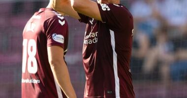 Lawrence Shankland applauds the Hearts fans as he's substituted after his two-goal haul