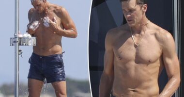 Shirtless Tom Brady rinses off in outdoor shower while yachting in Ibiza on Fourth of July