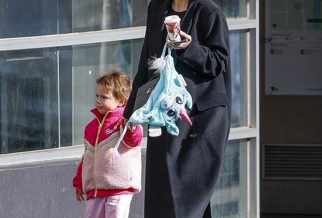 Snezana Wood has stepped out with a new hairdo. The former Bachelor star is sporting recently dyed red locks as she enjoyed a day out in Melbourne with her daughter Charlie, four, on Wednesday. Both pictured
