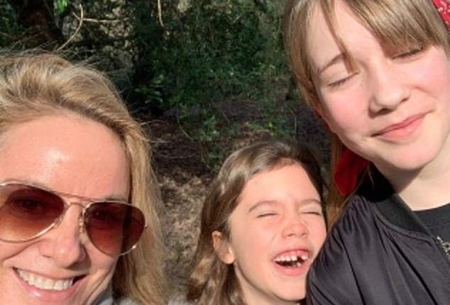 Tamzin Outhwaite has revealed her eldest child Flo, 17, is transgender (pictured with her two children Flo and Marnie, 12)