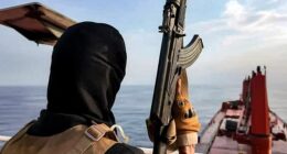 Yemen's Houthis released a propaganda video showing masked, armed men storming the shipping vessel Magic Seas on Sunday and simultaneous explosions that scuttled the ship