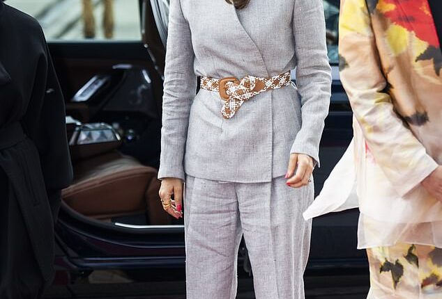 Last month Queen Mary of Denmark sparked controversy after stepping out in grey Bermuda-length culottes and a matching blazer designed by Copenhagen-based fashion house Mark Kenly Domino Tan