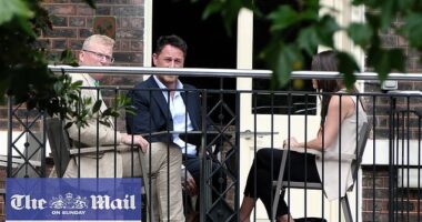 King Charles and Prince Harry's senior aides have held a secret peace summit in London (pictured: the head of communications for Royal Family Tobyn Andreae (left) and Meredith Maines head of communications for The Sussexes (right) with Liam Maguire, who runs the Sussexes' PR team in the UK (centre)