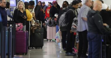 An impending tropical storm in the Gulf has set off a chain reaction of ground stops and lengthy delays at major airports along the entire East Coast Monday