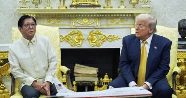 President Donald Trump meets with Philippine President Ferdinand Marcos Jr., in the Oval Office of the White House, Tuesday, July 22, 2025, in Washington. He accused Barack Obama of 'treason' during a question-and-answer session with reporters