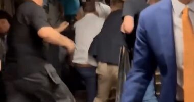 Footage circulating online caught a group of men fighting each other during a vicious melee on the steps of Highbury and Islington Tube station on Thursday afternoon
