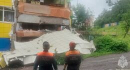 Rescuers inspect a kindergarten damaged by an earthquake in Petropavlovsk-Kamchatsky, Russia, Wednesday, July 30, 2025.
