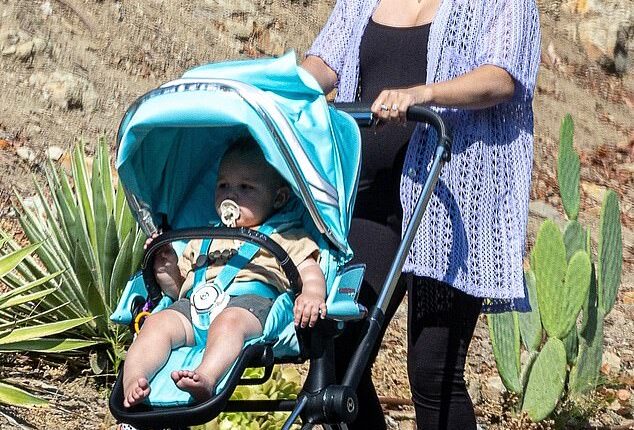Vanessa Hudgens, 36,  was spotted enjoying a walk with her baby on Thursday in Los Angeles. It was the first time they had been seen in public since announcing she was expecting a second child