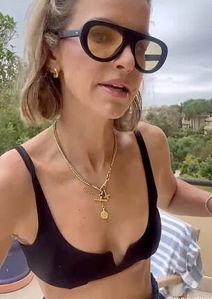 It was business as usual for Vogue Williams as she showed off her taut abs during another day in paradise on Wednesday