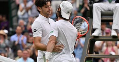Taylor Fritz (left) progressed after Australian Jordan Thompson retired due to back pain