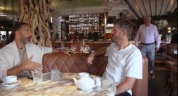 Sir Alex Ferguson was seen in the background as Rio Ferdinand spoke to Michael Carrick