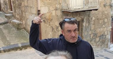 Derbyshire couple Sally Boole, 54, and her husband Martin, 56, outside the house in Mussomeli, Sicily, that they bought for only 1 euro