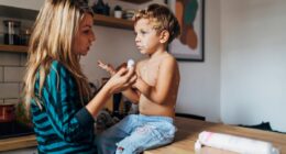 What are the symptoms of measles and how can I get my child vaccinated as cases rise?