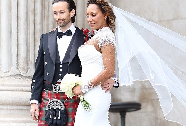 Geri Halliwell has so far failed to acknowledge her Spice Girl's bandmate Mel B 's star-studded wedding on Saturday (the couple are pictured)