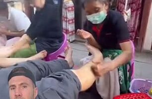 Dr Joe Whittington weighed in on a woman's video showing her boyfriend getting a $5 massage from an elderly worker in a backstreet alleyway in Thailand