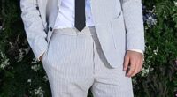Will Poulter (pictured) appeared to be wearing wonky trousers and odd socks