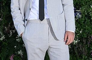 Will Poulter (pictured) appeared to be wearing wonky trousers and odd socks