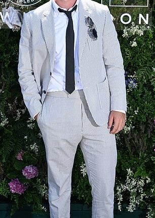 Will Poulter (pictured) appeared to be wearing wonky trousers and odd socks