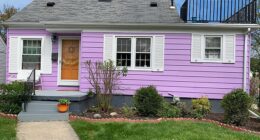 A Michigan couple who transformed their home into a vibrant purple cottage (pictured) were left speechless after receiving a mysterious handwritten letter - and a gift - from a neighbor, clearly moved by their color choice