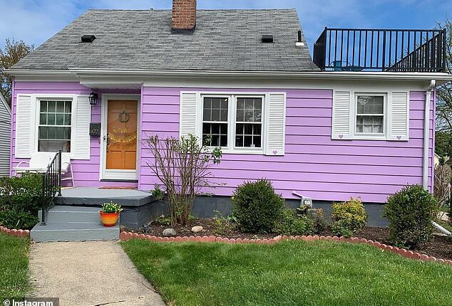 A Michigan couple who transformed their home into a vibrant purple cottage (pictured) were left speechless after receiving a mysterious handwritten letter - and a gift - from a neighbor, clearly moved by their color choice