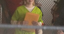 Angel-faced teen Sarah Grace Patrick, who stands accused of killing her mom and stepdad, walked into the Carroll County Superior Courthouse, appearing carefree with a big smile planted across her face