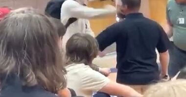 Viral footage shows the hulking Lincoln High School student throwing punches at a staff member before being slammed to the ground