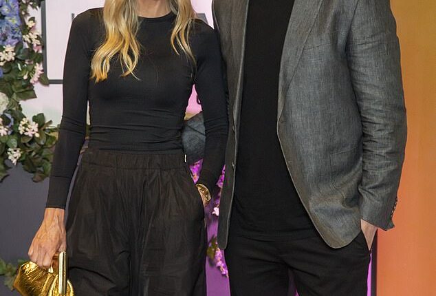 AFL star Nick Holland (right) and his lawyer wife Rachel (left) have split after 16 years of marriage. Both pictured