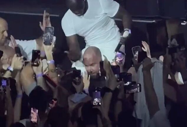 Akon slapped his security guard on the head in front of fans during a performance this week in Russia
