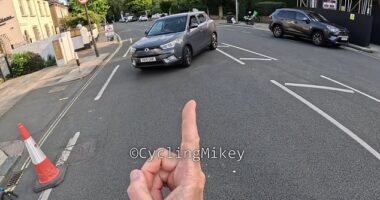 Vigilante Cycling Mikey returned to the scene where he pushed his bike in front of a car to perform the same stunt again