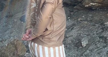 A picture of Frank¿s clasped hands and upright stance as he watched Wilf and sister Romy, three, play while on their recent holiday in Greece was strikingly similar to the former prime minister