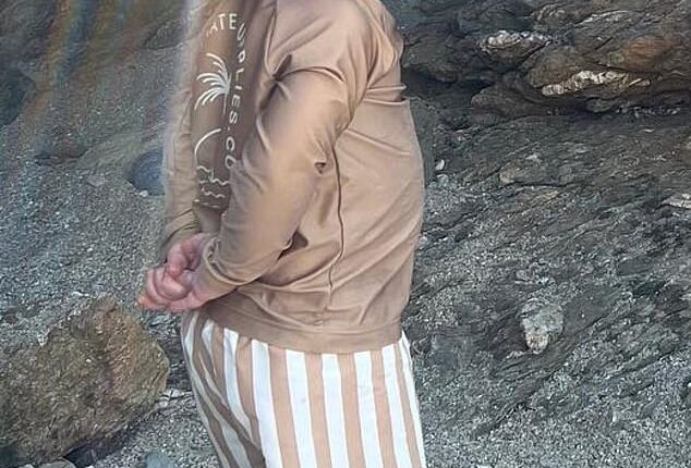 A picture of Frank¿s clasped hands and upright stance as he watched Wilf and sister Romy, three, play while on their recent holiday in Greece was strikingly similar to the former prime minister