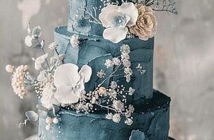 The bride had paid a professional baker to create her 'dream' three-tier cake in a muted, soft shade of dusty blue