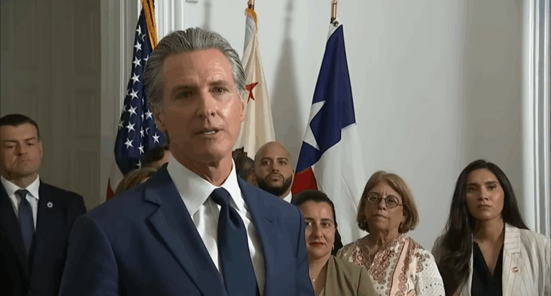 Gavin Newsom speaking at a presser.