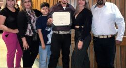 Adela Magan¿a (second from left) lost her arm after a freak accident on a mini golf course where her family (pictured with her) was celebrating her son's birthday