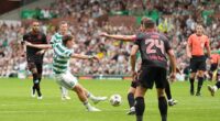 Celtic's Luke McCowan finally breaks St Mirren's resistance with the aid of a deflection