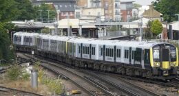 A South Western Railway train leaves Basingstoke station in Hampshire in February 2022
