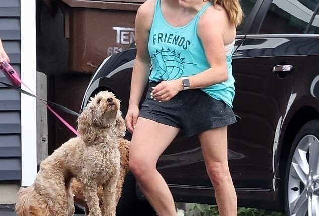 Conjoined twins Abby and Brittany Hensel were spotted out with their Labradoodl pups this week, taking it to a groomer