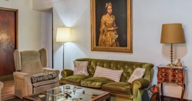 'Portrait of a Lady was pictured hanging over a sofa in a real estate listing posted by Robles Casas & Campos