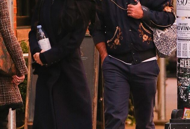 Tim McGraw's daughter Audrey McGraw has been dating actor Manuel Garcia-Rulfo for two years, despite a 21-year age gap. They're seen here in October 2024