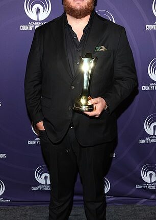 Luke Combs, 35, is a confirmed Swiftie and would love to collaborate with the superstar; Pictured in Nashville on Wednesday