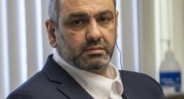 Ihsan Ali, 44, listens as his daughter Fatima Ali tells the court at his attempted murder trial how he tried to choke the life out of her in an alleged 'honor killing'