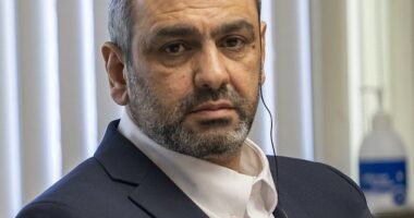 Ihsan Ali, 44, listens as his daughter Fatima Ali tells the court at his attempted murder trial how he tried to choke the life out of her in an alleged 'honor killing'