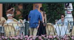 David Beckham cheekily grabbed his wife Victoria's bum during a family meal in Portofino on Friday