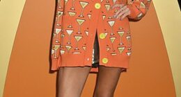 Denise Van Outen put on a very leggy display in an orange cardigan as she attended Wilderness Festival 2025 alongside Mary Charteris at Cornbury Park on Saturday
