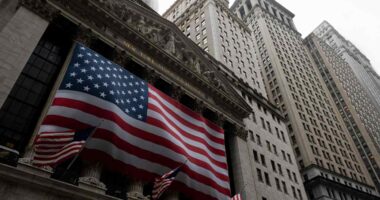 Dow ends just shy of record after touching new intraday high, as Buffett gives Wall Street a boost