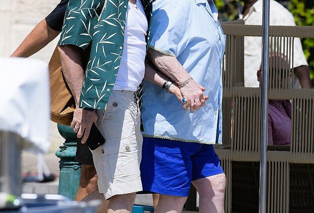 Elton John and his husband David Furnish showed their marriage is stronger than ever as they departed their £23 million yacht hand-in-hand on Sunday