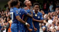 Chelsea moved to the top of the Premier with a controversial 2-0 win over Fulham